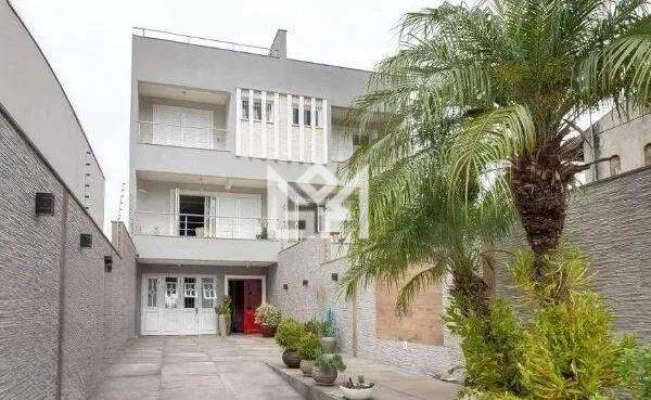 Casa com 4 quartos para aluguel, 395m² - Jardim Itu - Porto Alegre: 