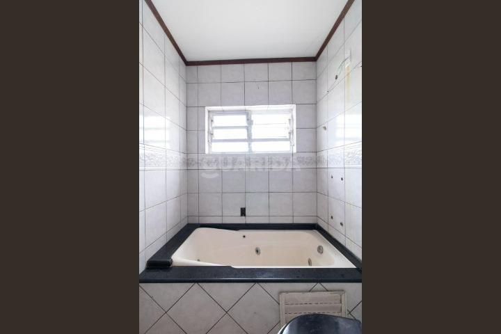 casa sobrado para alugar em Rua Glênio Peres, 130 - foto 7