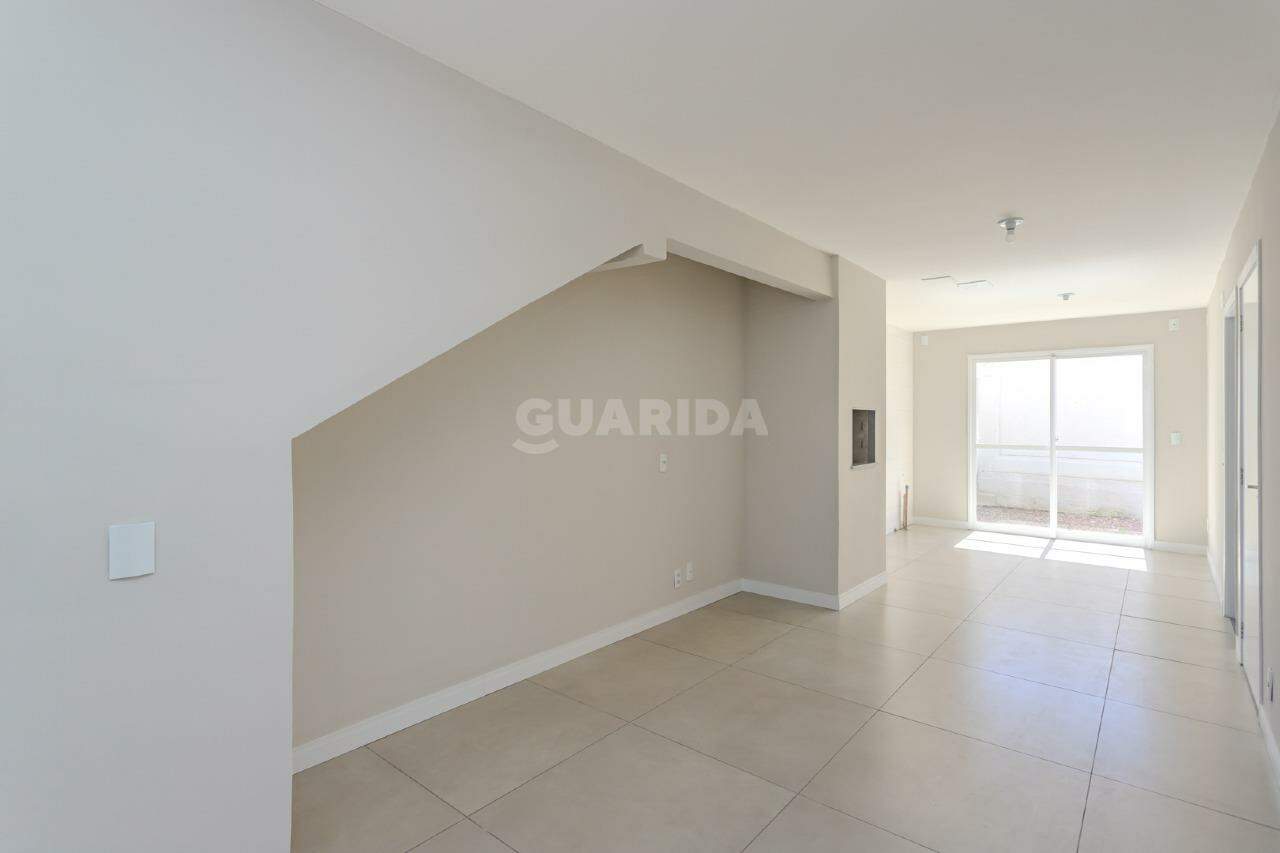 Casa em condominio para alugar em Vila Nova, Porto Alegre - foto 1