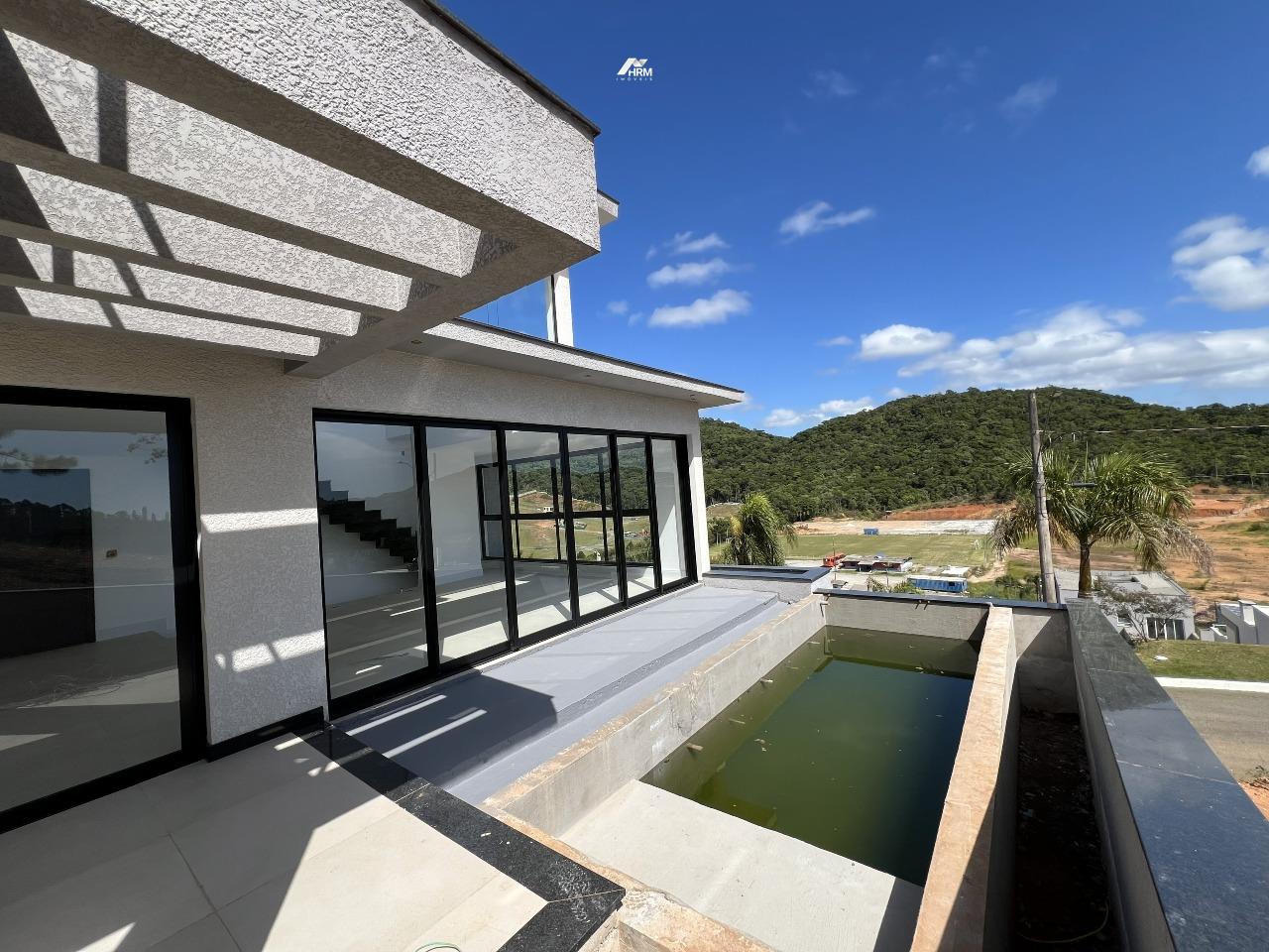 Casa de Condomínio à venda no Centro: 