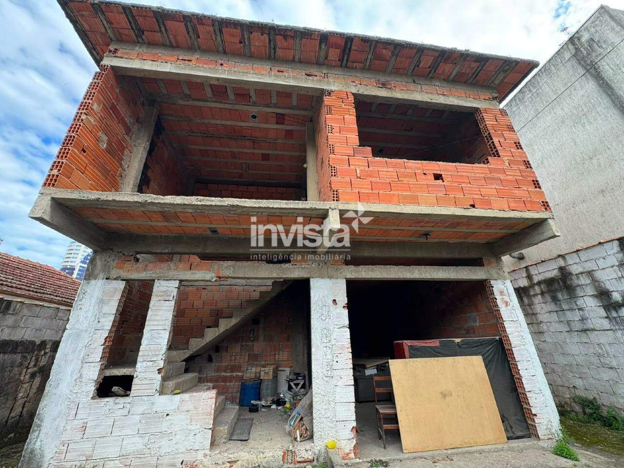 Casa com excelente terereno de 200m2 na ponta da praia. - Santos