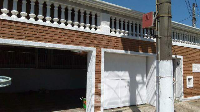 Casa à venda com 3 quartos, 100m² - Foto 3