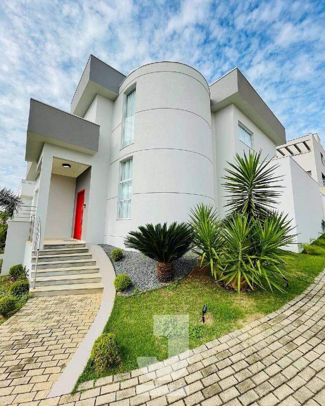 Casa de Condomínio à venda com 4 quartos, 290m² - Foto 1