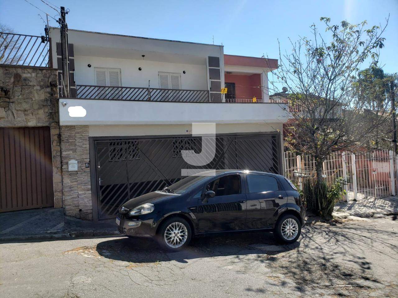 Casa à venda com 3 quartos, 238m² - Foto 1