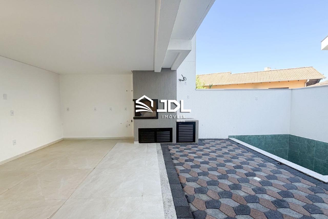 Excelente casa no Bairro Escola Agrícola com 3 suítes - foto 1