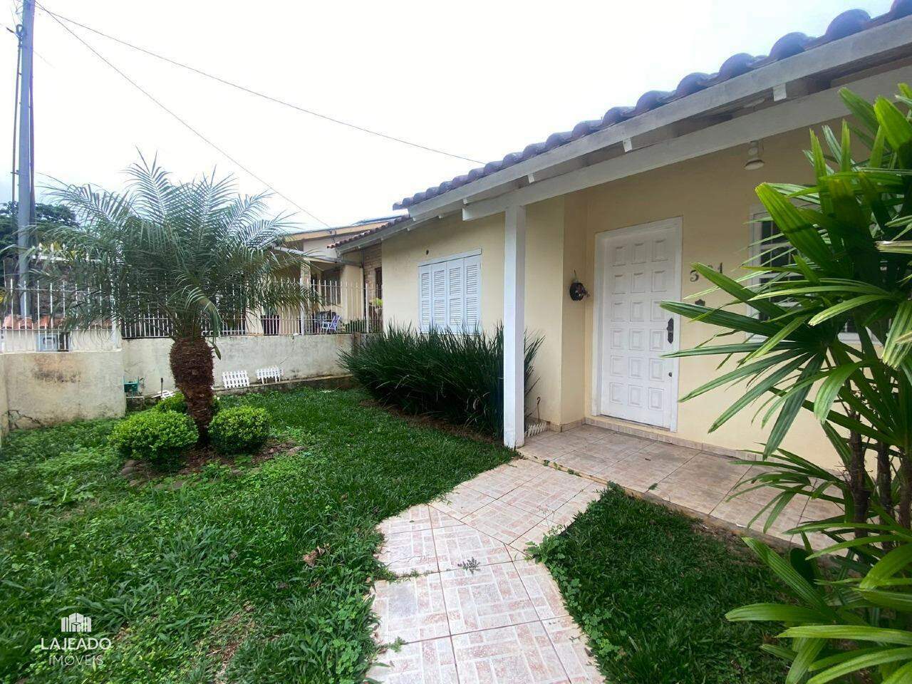 Casa à venda com 3 quartos, 89m² - Foto 1