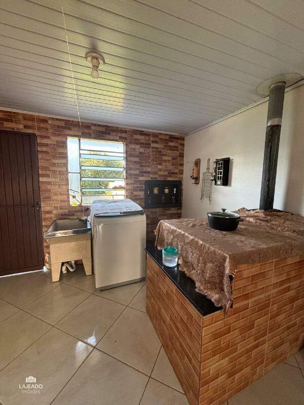 Casa à venda com 3 quartos, 90m² - Foto 5