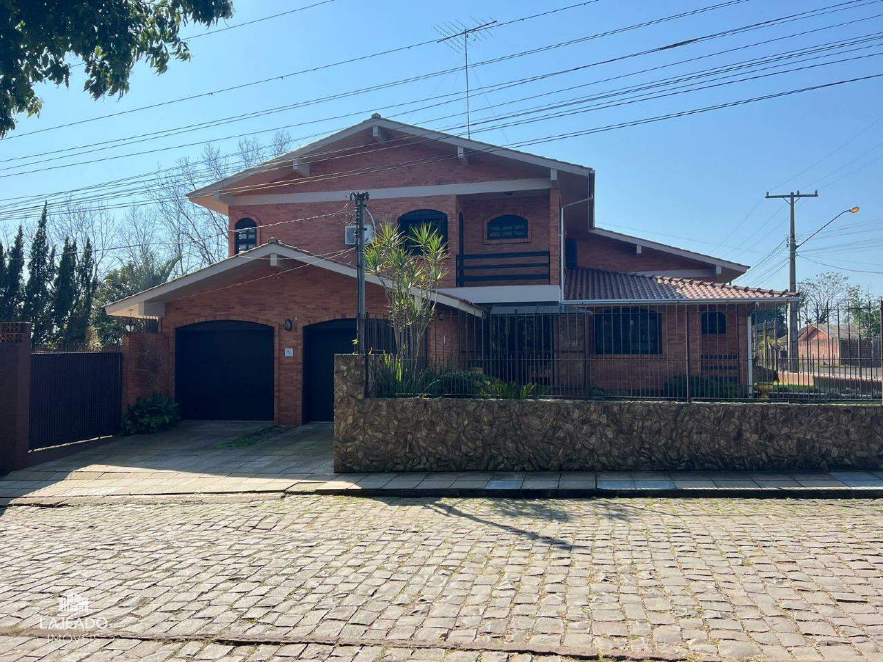 Casa à venda com 4 quartos, 333m² - Foto 1