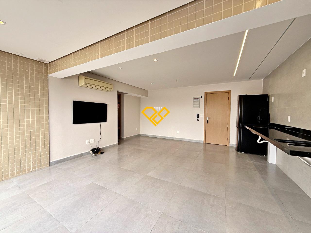 Apartamento à venda no Ponta da Praia: Sala, varanda e cozinha