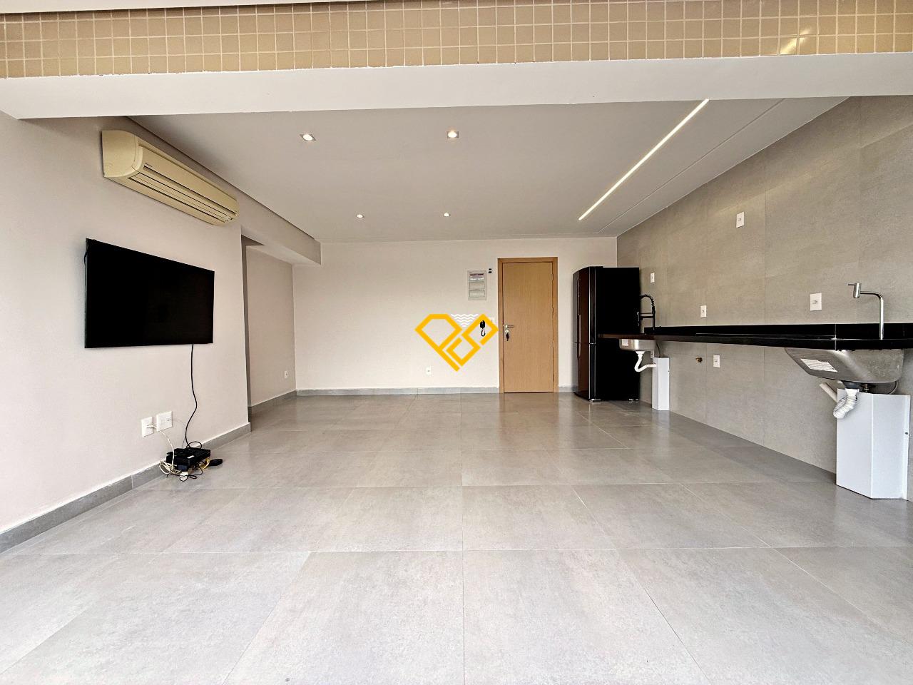 Apartamento à venda no Ponta da Praia: Sala, varanda e cozinha