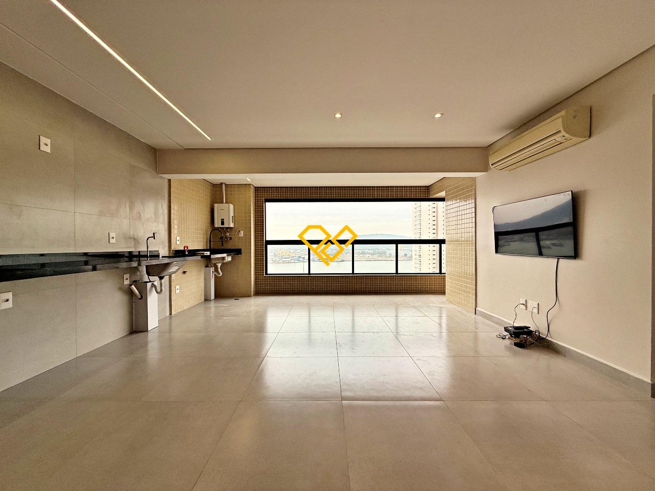 Apartamento à venda no Ponta da Praia: Sala, varanda e cozinha