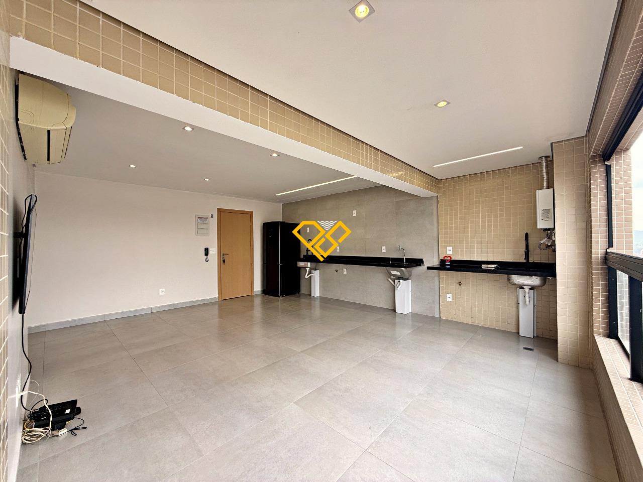 Apartamento à venda no Ponta da Praia: Sala, varanda e cozinha