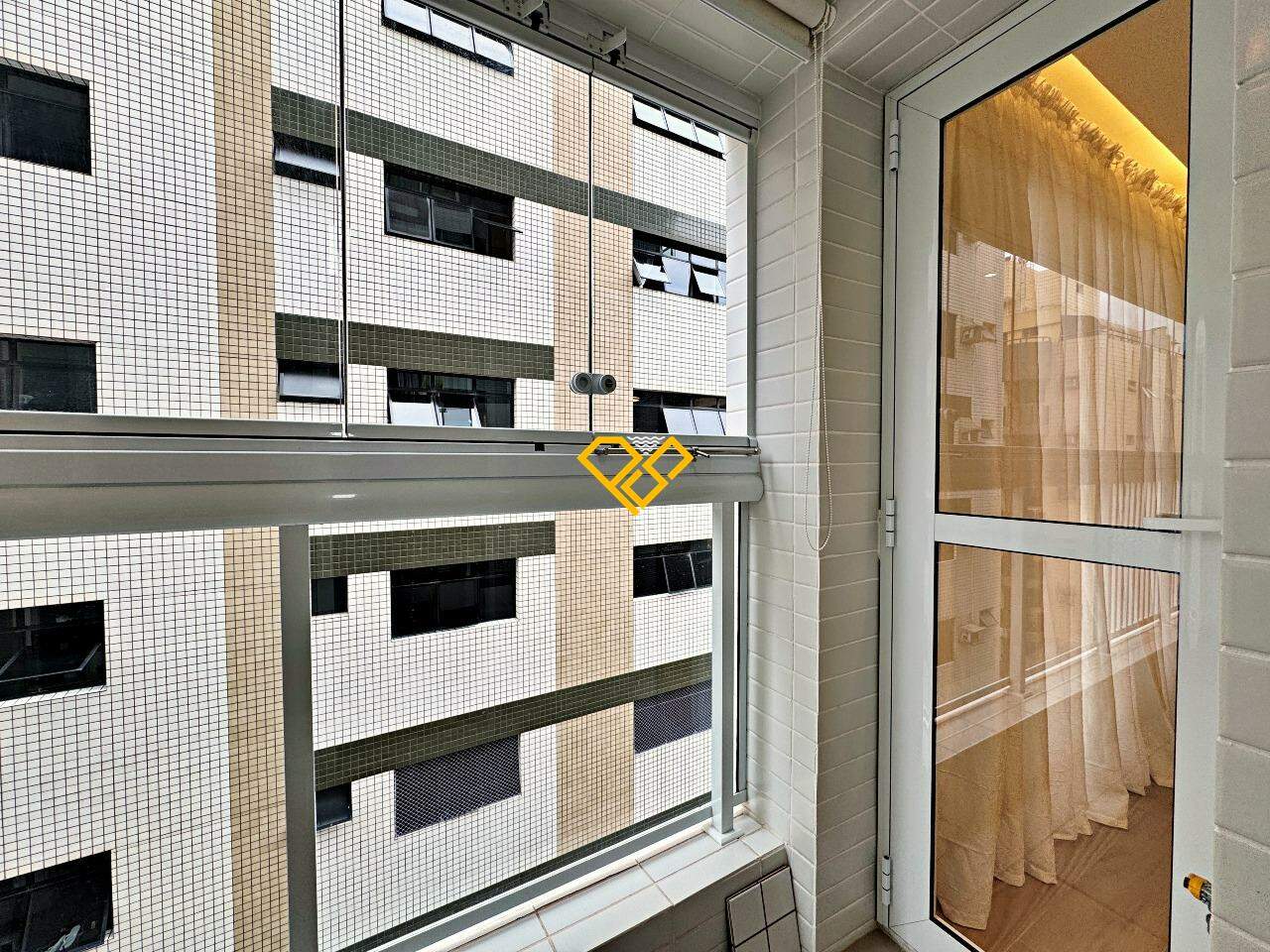 Apartamento à venda no Aparecida: Varanda da cozinha