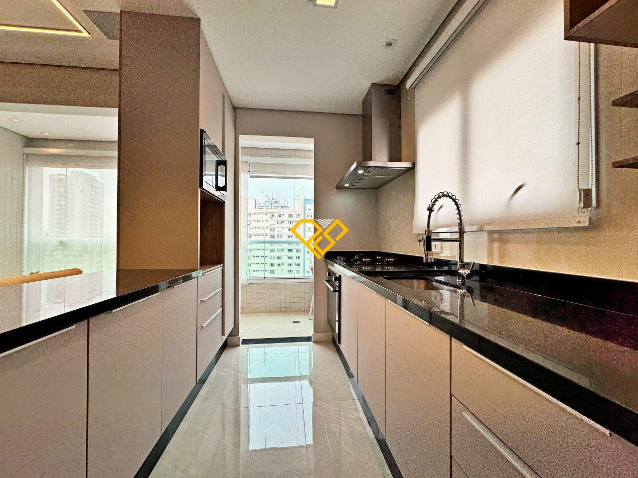 Cobertura à venda no Embaré: Cozinha - 1° piso