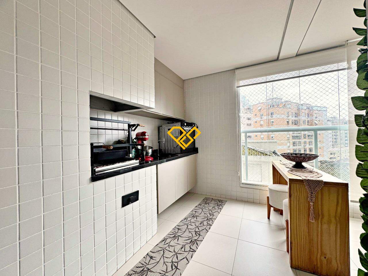 Apartamento à venda no Gonzaga: Varanda com churrasqueira