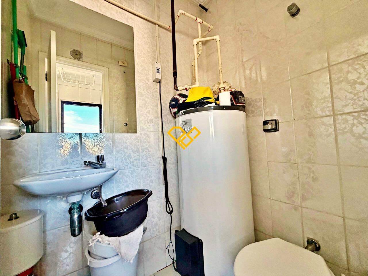 Apartamento à venda no Gonzaga: Wc de serviço