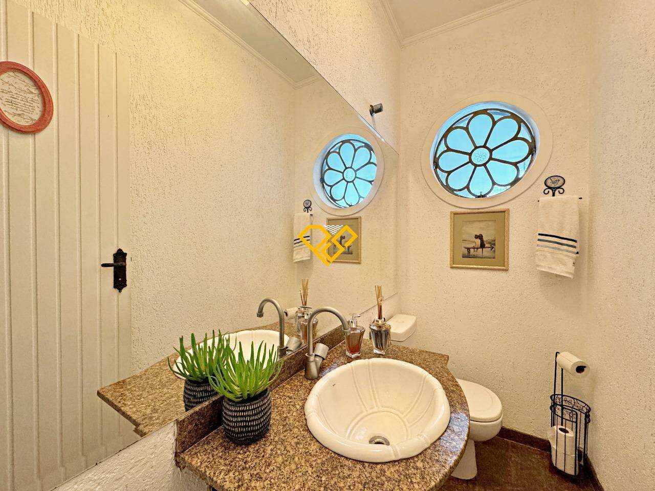 Casa à venda no Ponta da Praia: Lavabo