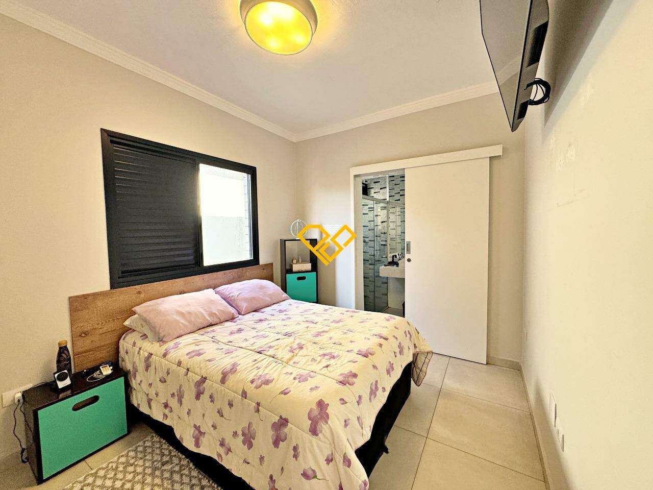 Casa à venda no Ponta da Praia: Dormitório 1 - suíte