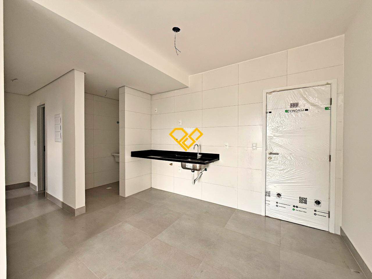 Apartamento à venda no Macuco: Sala e cozinha integrada