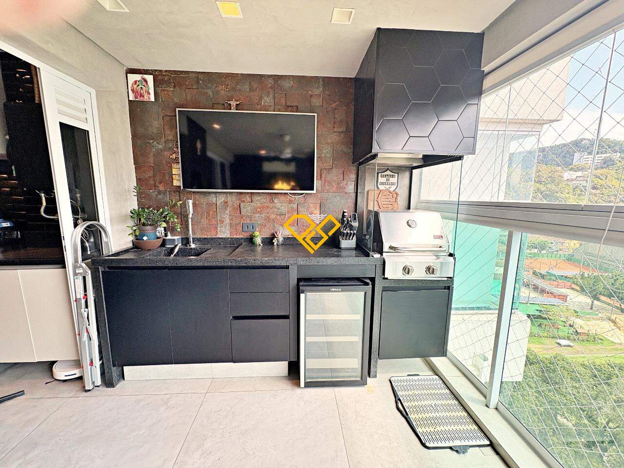 Apartamento à venda no José Menino: Varanda com churrasqueira