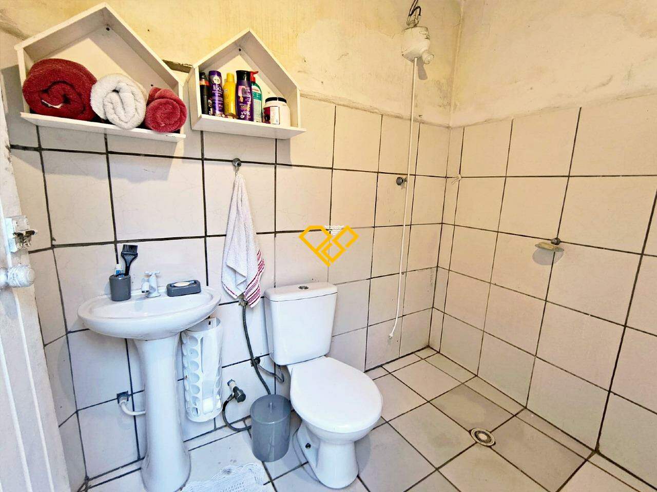 Casa à venda no Vila Mathias: Wc de serviço