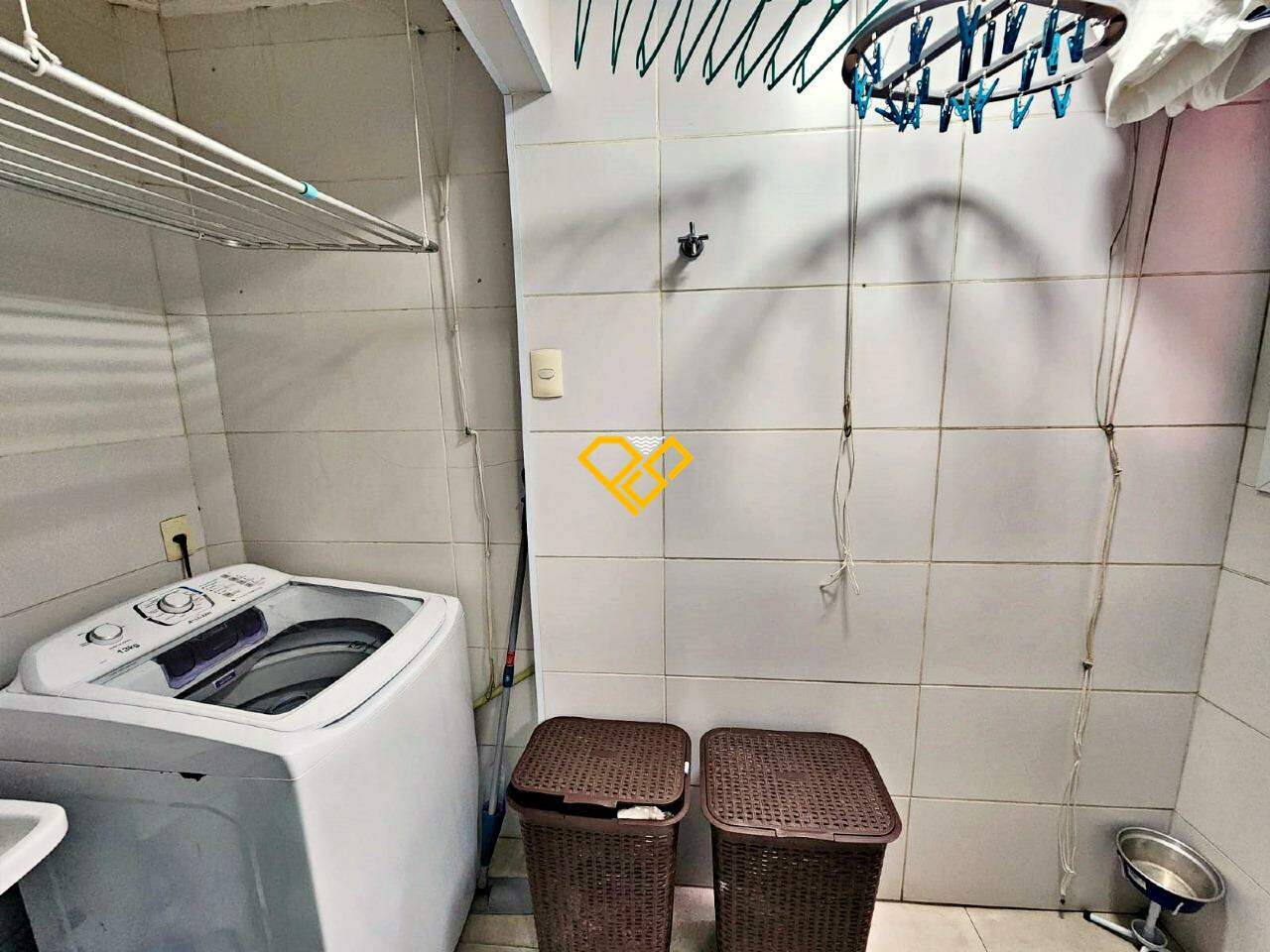 Casa em Condomínio à venda no Marapé: Área de serviço