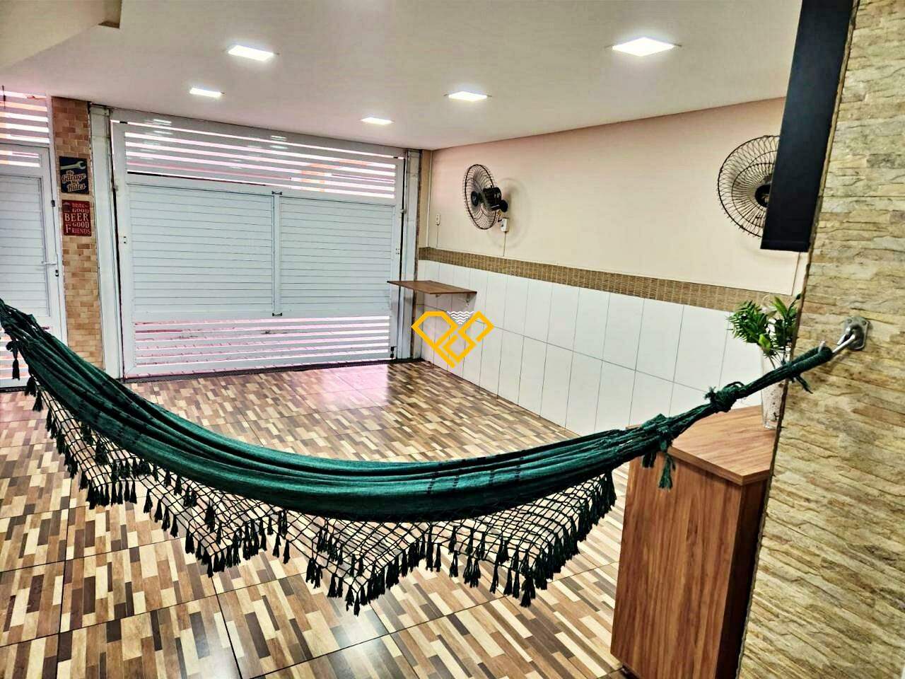 Casa em Condomínio à venda no Marapé: Garagem com churrasqueira