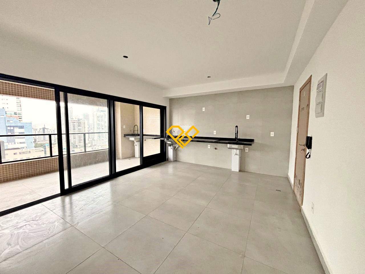 Apartamento à venda no Ponta da Praia: Sala integrada a cozinha