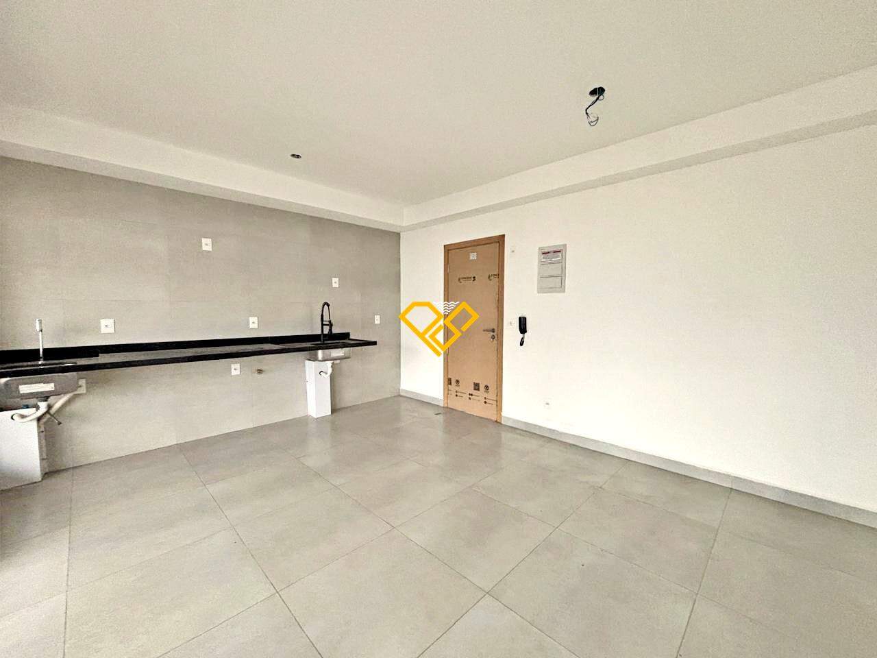 Apartamento à venda no Ponta da Praia: Sala integrada a cozinha