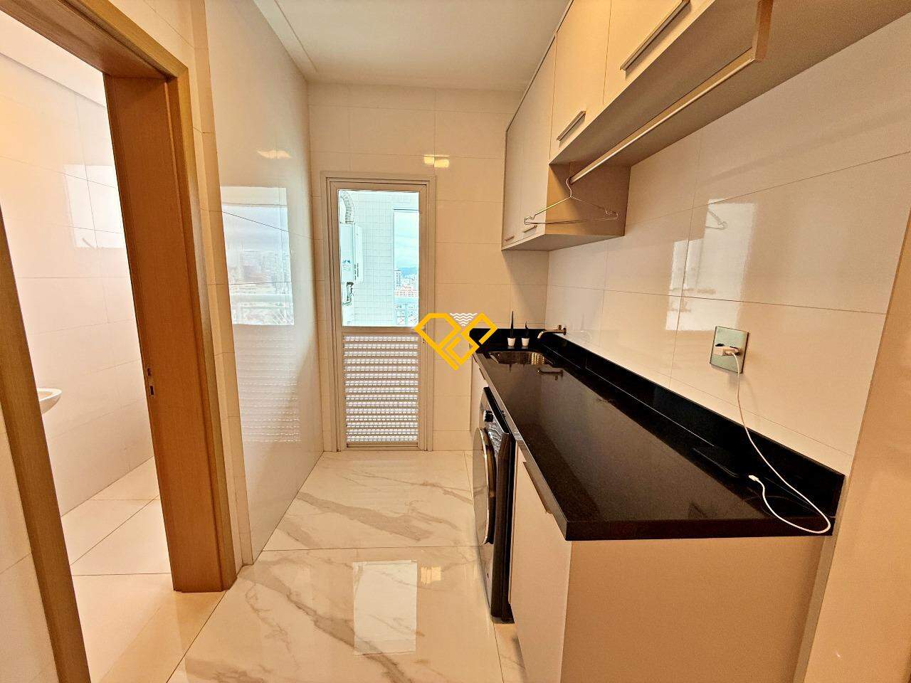 Apartamento à venda no Ponta da Praia: Área de serviço