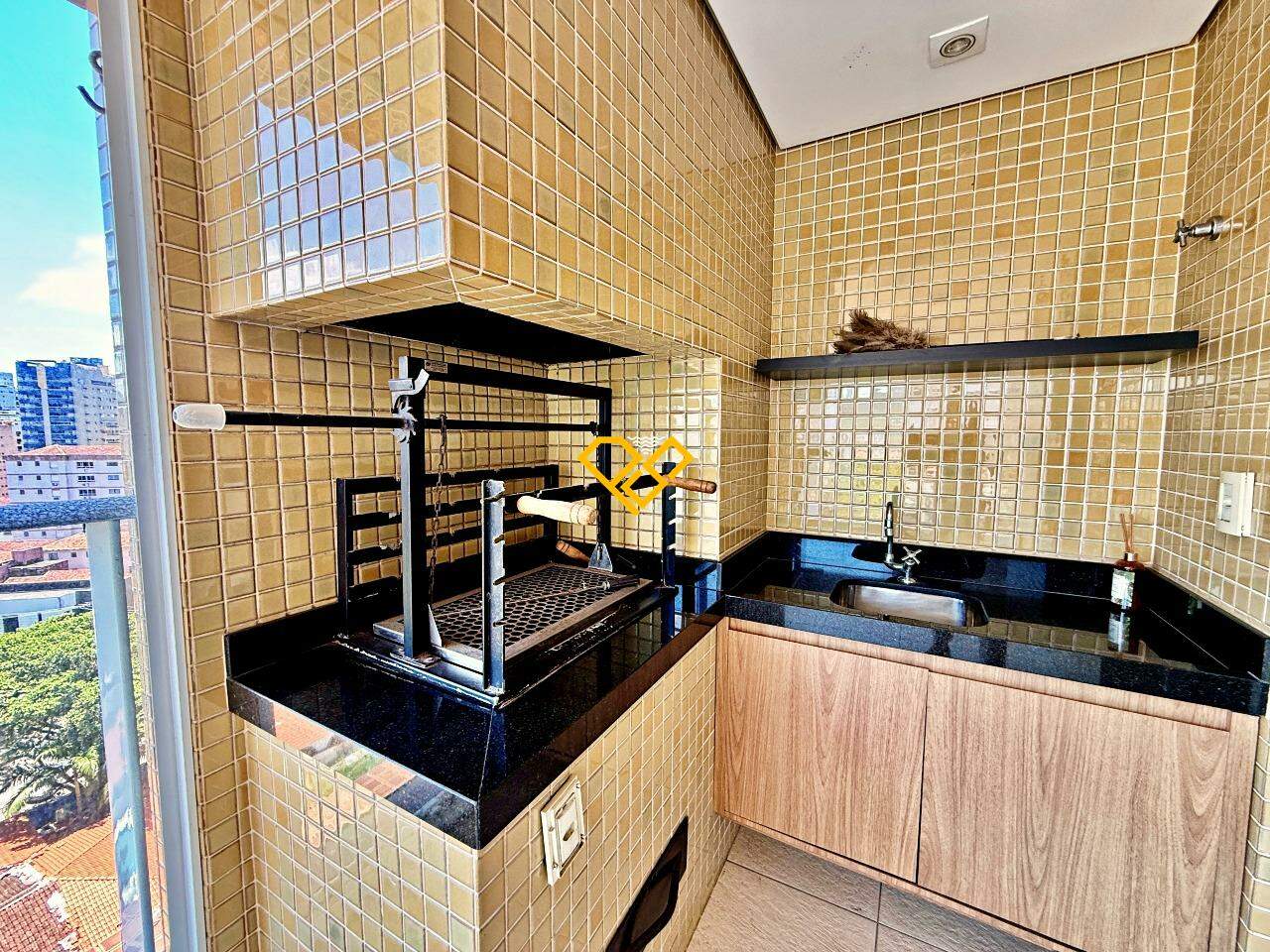 Apartamento à venda no Gonzaga: Varanda com churrasqueira