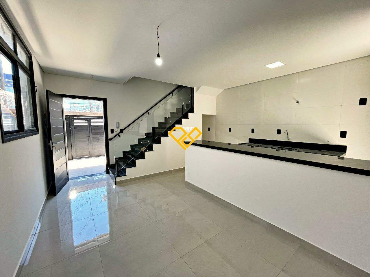 Casa à venda no Macuco: Sala e cozinha integrados