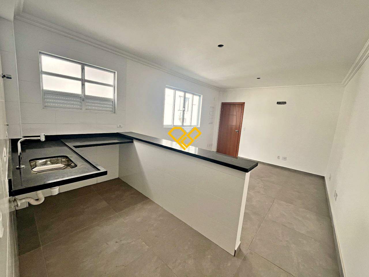 Apartamento à venda no Macuco: Sala e cozinha integrada