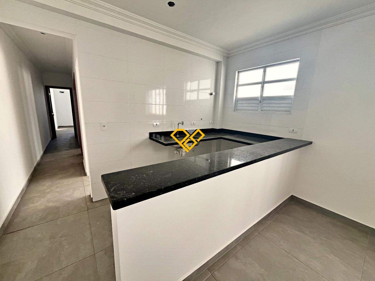 Apartamento à venda no Macuco: Sala e cozinha integrada