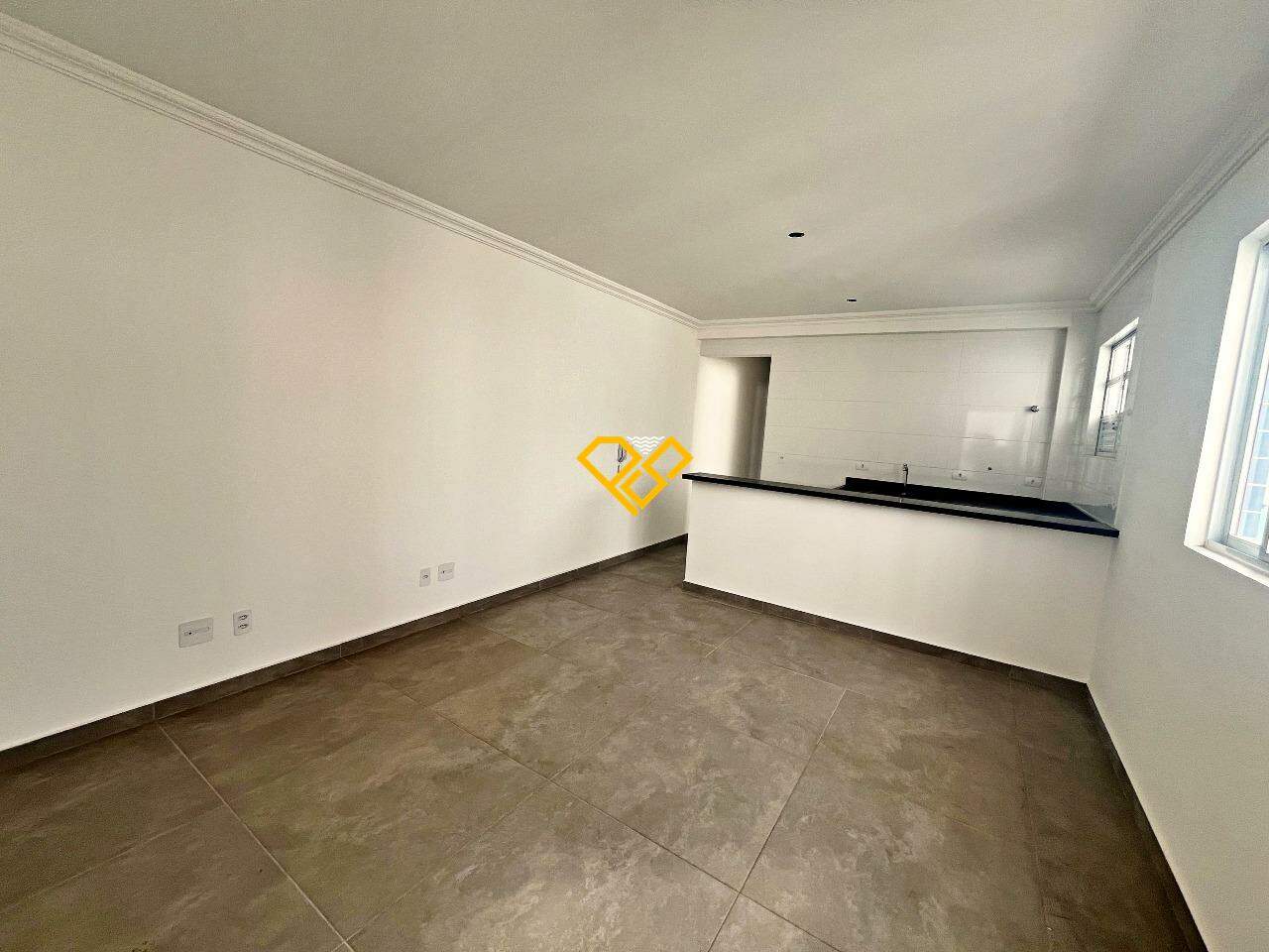 Apartamento à venda no Macuco: Sala e cozinha integrada