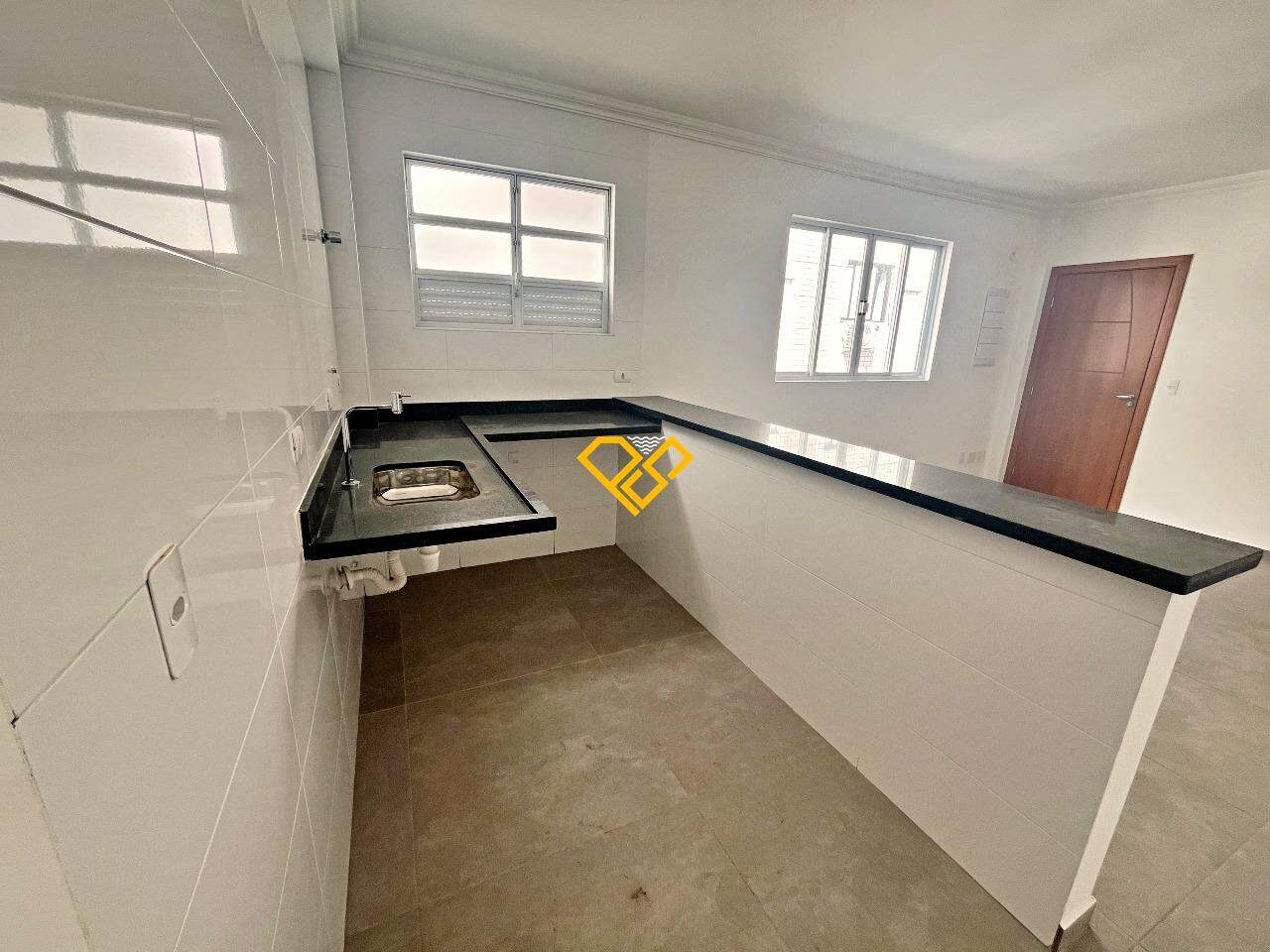 Apartamento à venda no Macuco: Sala e cozinha integrada