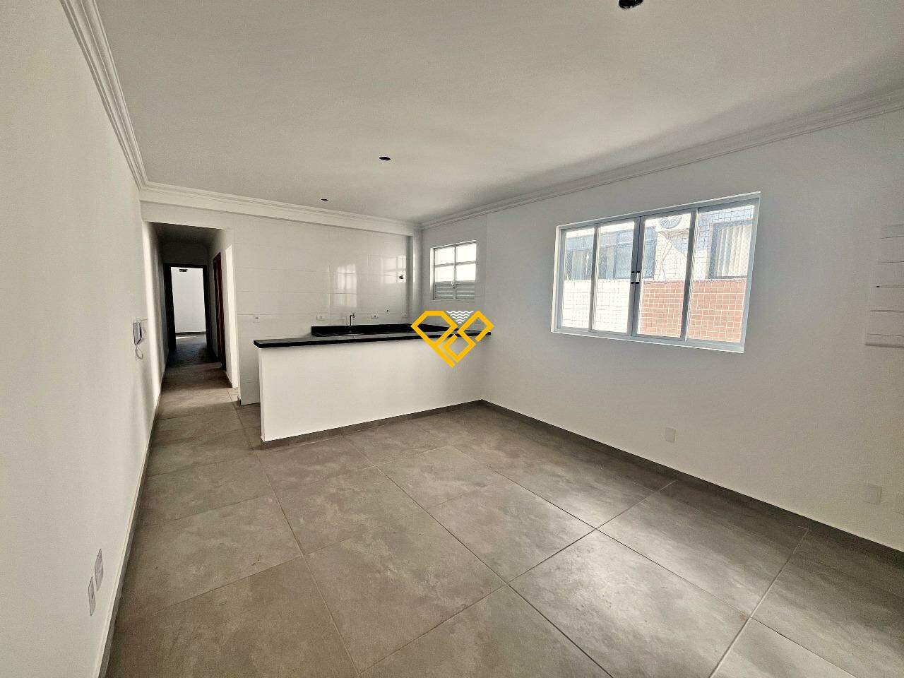 Apartamento à venda no Macuco: Sala e cozinha integrada