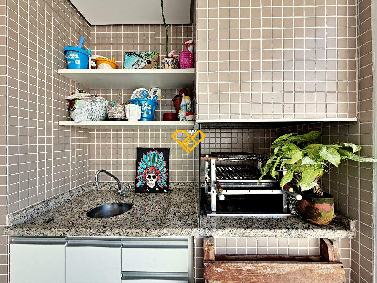 Apartamento à venda no José Menino: Varanda com churrasqueira