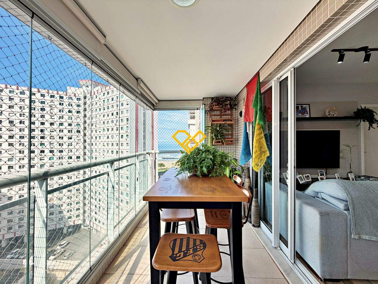 Apartamento à venda no José Menino: Varanda com churrasqueira