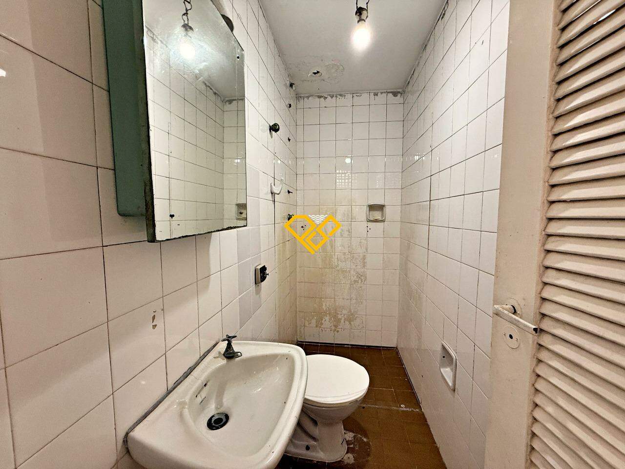 Apartamento à venda no Aparecida: Wc de serviço