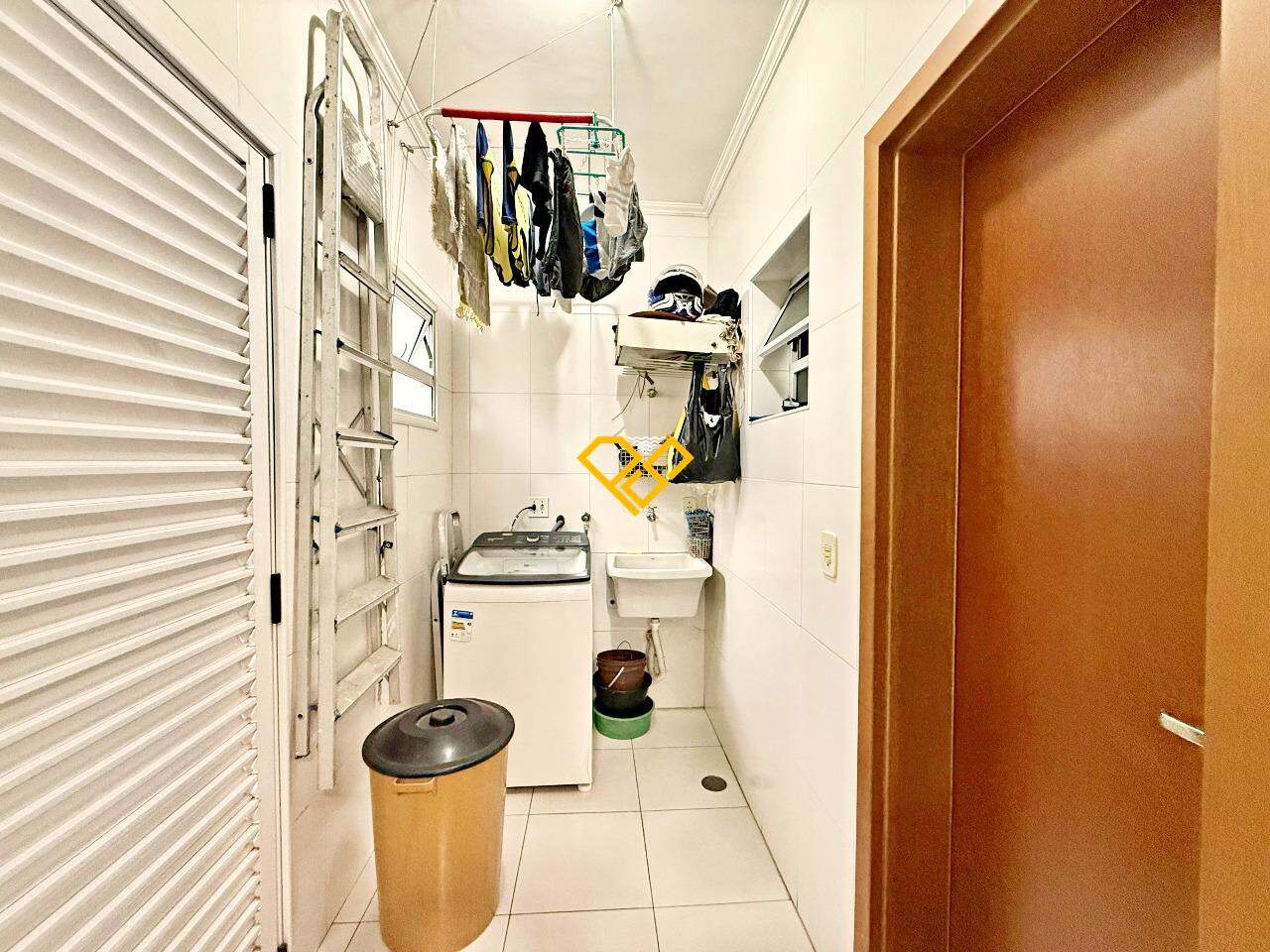 Casa em Condomínio à venda no Ponta da Praia: Área de serviço