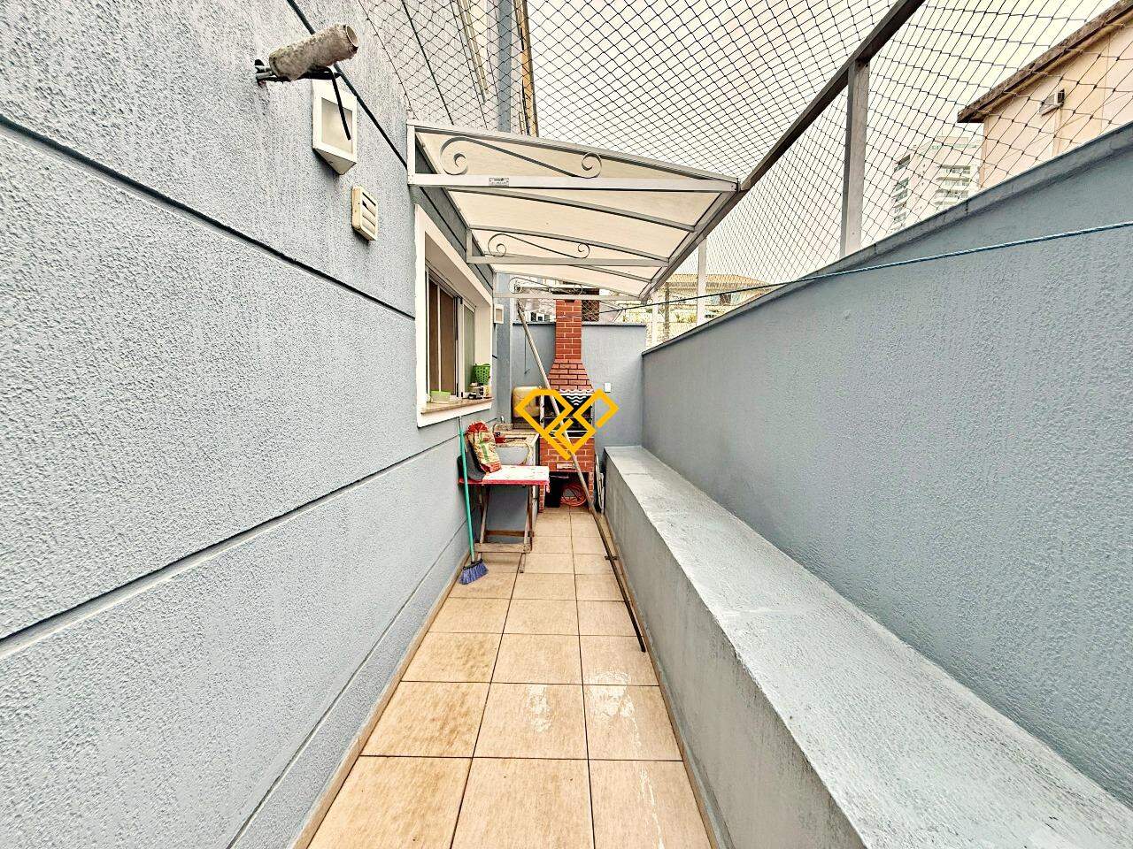 Casa em Condomínio à venda no Ponta da Praia: Área gourmet com churrasqueira