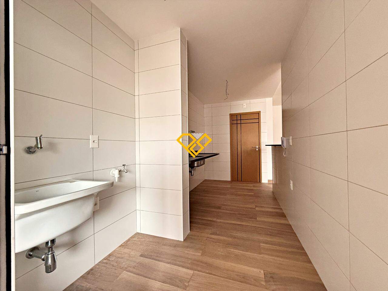 Garden à venda no Aparecida: Área de serviço e cozinha