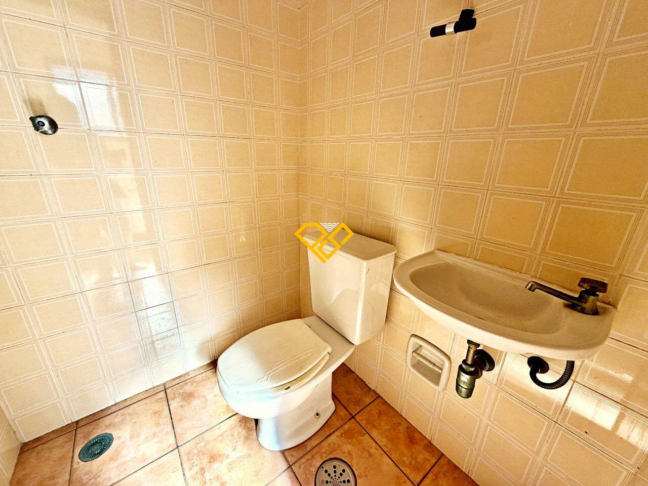 Apartamento à venda no Aparecida: Wc de serviço