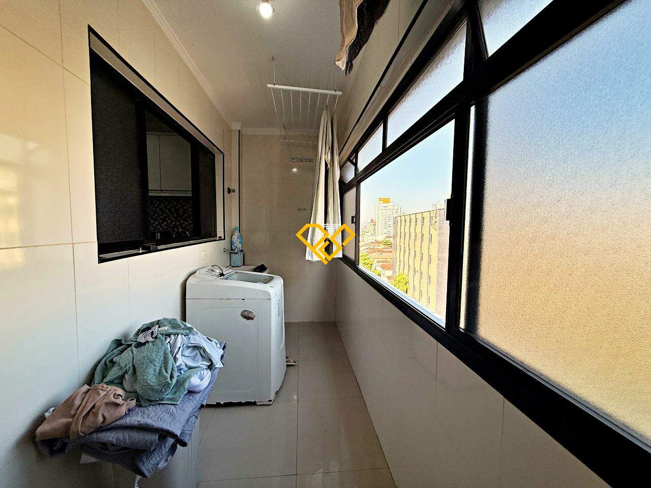 Cobertura à venda no Vila Mathias: Área de serviço