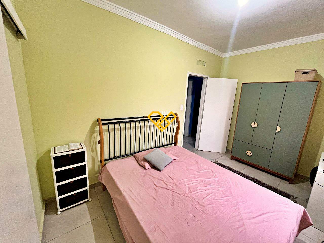 Casa à venda no Ponta da Praia: Dormitório 1 - suíte