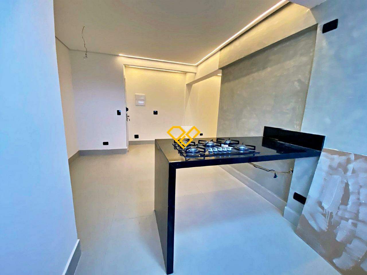 Apartamento à venda no Ponta da Praia: Sala e cozinha integrada