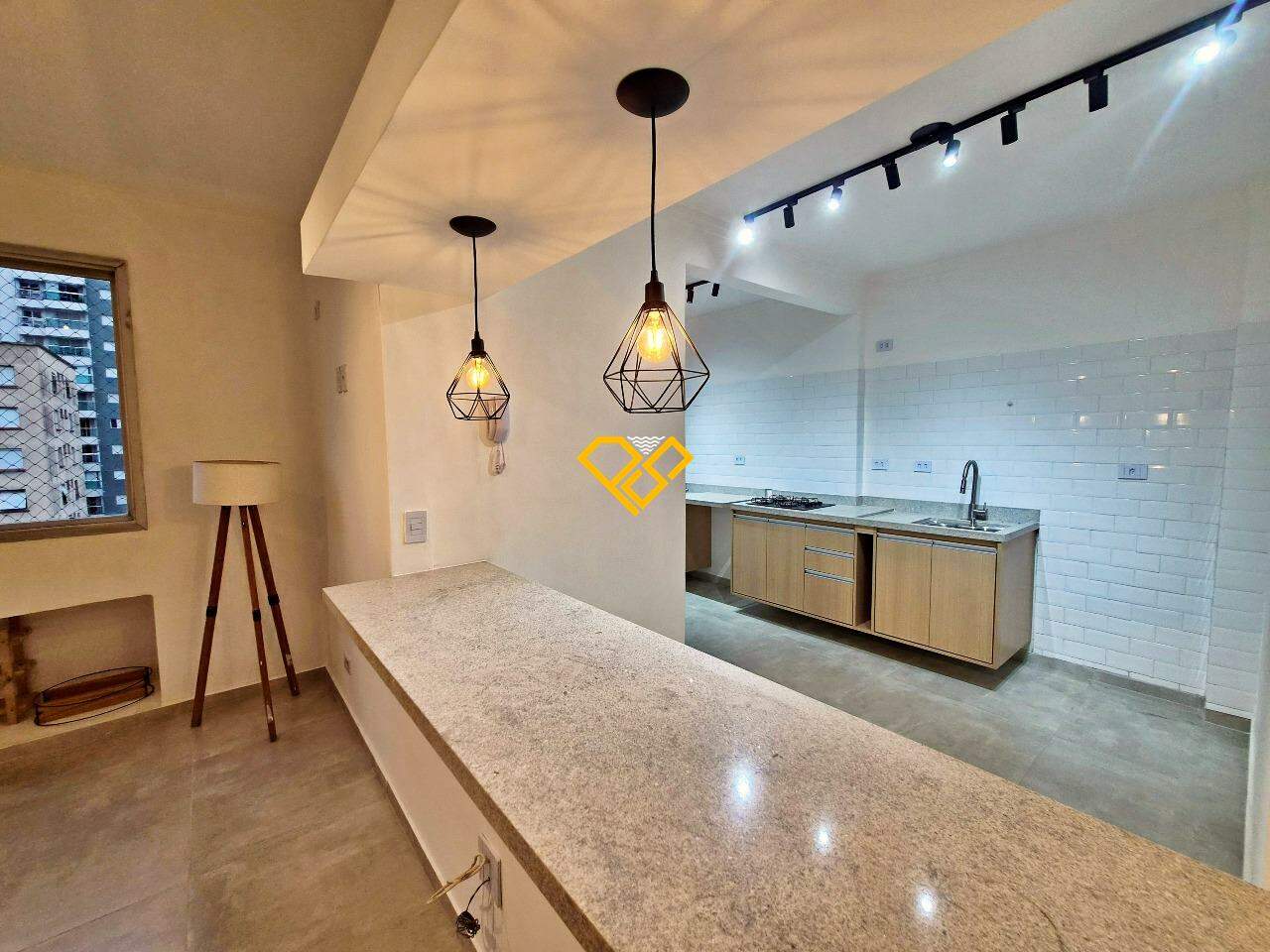 Apartamento à venda no Embaré: Salam e cozinha
