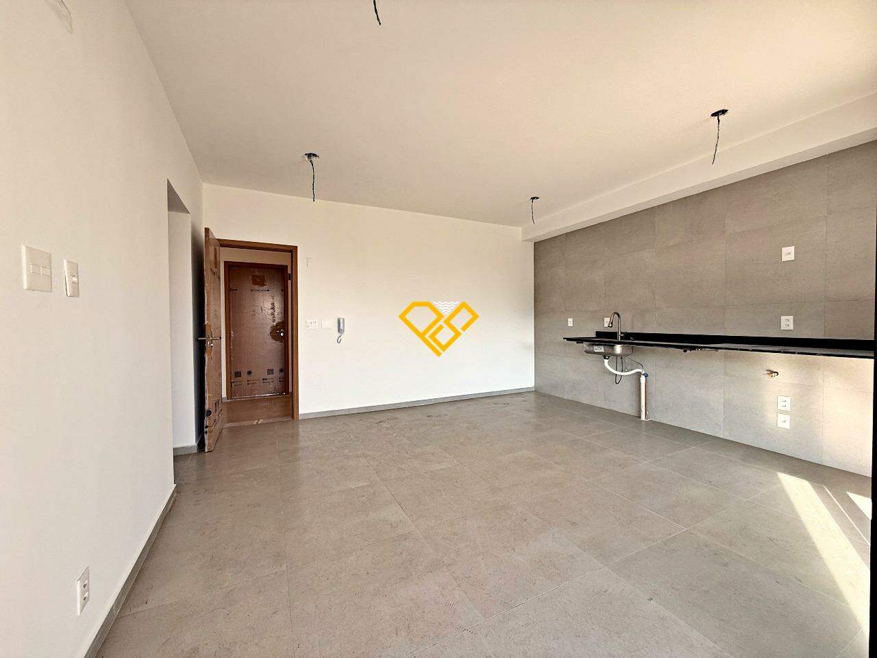 Apartamento à venda no José Menino: Sala e cozinha integrada