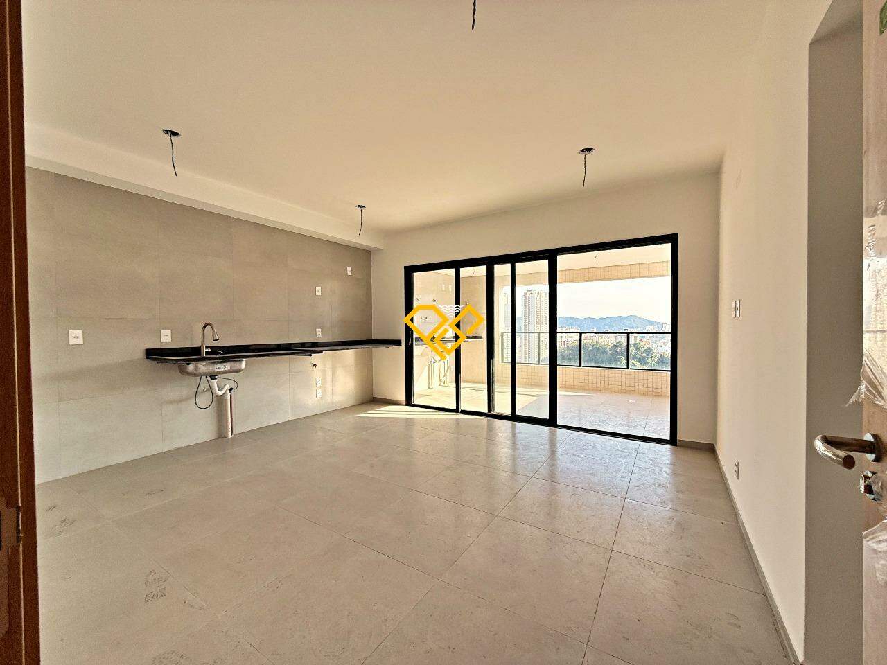 Apartamento à venda no José Menino: Sala e cozinha integrada
